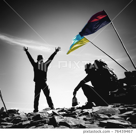 Silhouettes of people in the Ukrainian mountains and national symbols Silhouettes of people in the Ukrainian mountains and national symbols 76439467