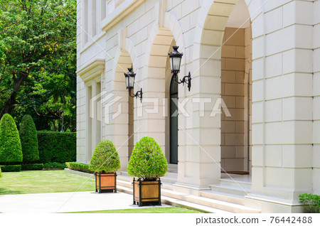 Typical english building with garden Typical english building with garden 76442488