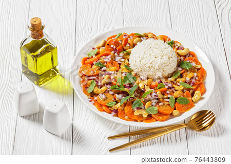 carrot curry with basmati rice, top view 76443809