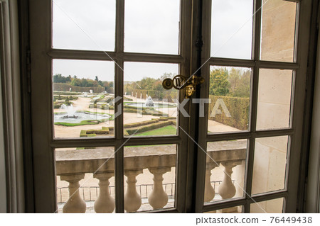 A well-maintained garden seen from the window of the Palace of Versailles in Paris, France A well-maintained garden seen from the window of the Palace of Versailles in Paris, France 76449438