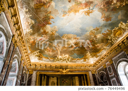 Ceiling with mysterious paintings of the Palace of Versailles in Paris, France 76449496