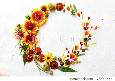 Flower composition on a wooden white background 76450337