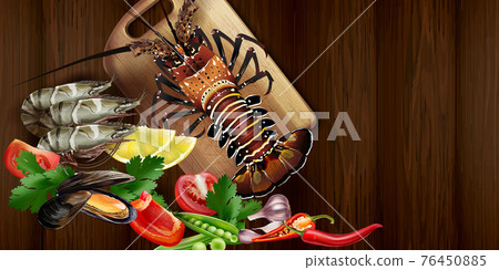 Lobster and seafood on the kitchen table. 76450885