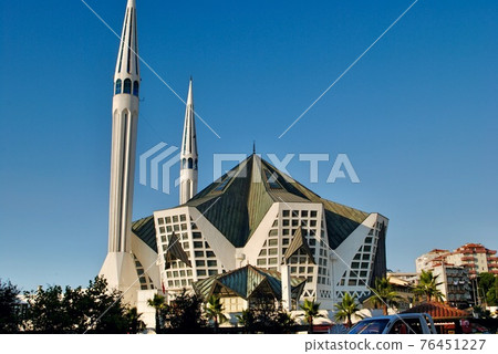 The unusual style exterior of Akcakoca Central Mosque against blue sky. Designed by Ergun Subasi. 20th Century. Akcakoca Turkey 76451227
