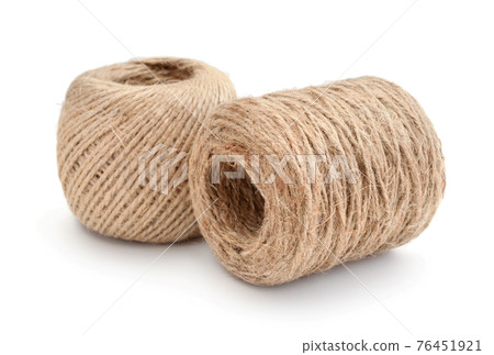 Skeins of natural jute twine isolated. Skeins of natural jute twine isolated. 76451921