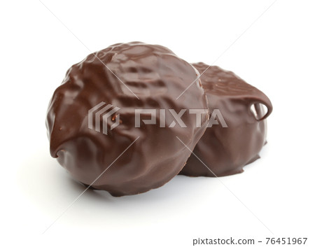 Marshmallows in chocolate isolated. Marshmallows in chocolate isolated. 76451967