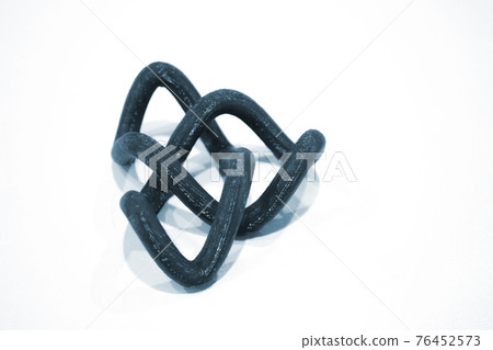 Abstract object printed by 3d printer on white background. 76452573