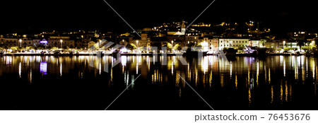 Croatian town by night - Makarska Croatian town by night - Makarska 76453676