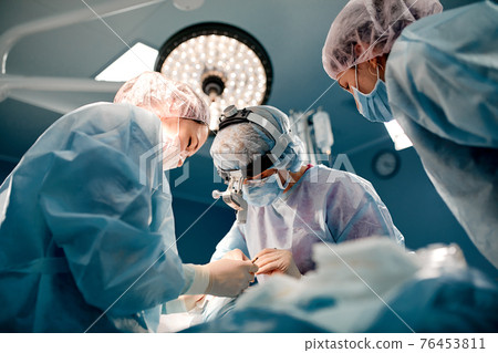 A team of surgeons is fighting for life, for a real operation, for real emotions. The intensive care team is fighting for the life of the patient. Saving life, the struggle for life 76453811