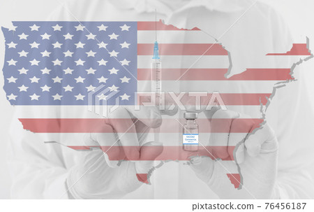 Doctor hands holding a vaccine bottle and syringe, with map of United States of America. Beginning of mass vaccination in USA for coronavirus COVID-19 conceptual photo. 76456187
