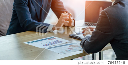 Businessman talking in the office Businessman talking in the office 76458246