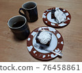 Chocolate cake and coffee 76458861