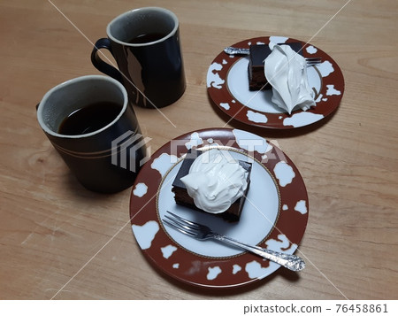 Chocolate cake and coffee Chocolate cake and coffee 76458861
