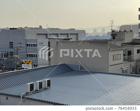 Factory in the city Factory in the city 76458933