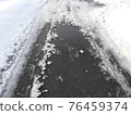 Frozen road in winter 76459374