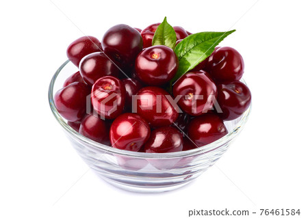 glass bowl of sweet cherry fruits isolated on white background glass bowl of sweet cherry fruits isolated on white background 76461584