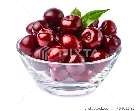 glass bowl of sweet cherry fruits isolated on white background 76461585