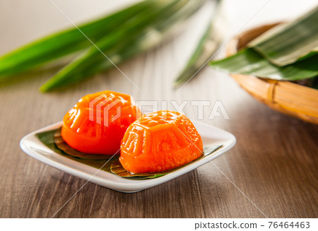 Asian Nyonya Food - kuih angku (Red Tortoise Cake traditional cake made of glutinous rice flour with red bean paste filling) Asian Nyonya Food - kuih angku (Red Tortoise Cake traditional cake made of glutinous rice flour with red bean paste filling) 76464463