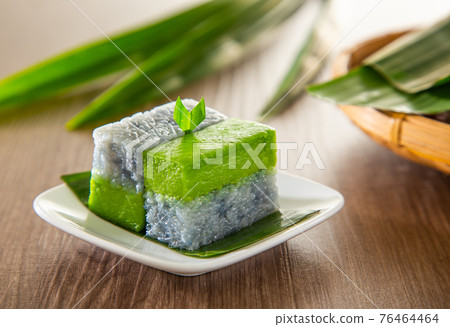 Kuih talam or Kuih Seri Muka, traditional Malaysian Nyonya sweet cake. Also know as Pandan coconut layered cake. Kuih talam or Kuih Seri Muka, traditional Malaysian Nyonya sweet cake. Also know as Pandan coconut layered cake. 76464464