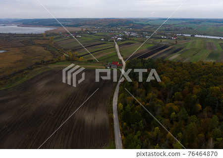 Panoramic view of Ukrainian fields and forests in Ternopil in autumn. 76464870
