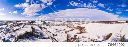 Ukrainian village in winter, panorama of snow-covered village, view of the village from above, winter panorama. 76464902