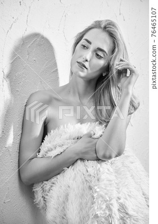 beautiful blond woman 76465107