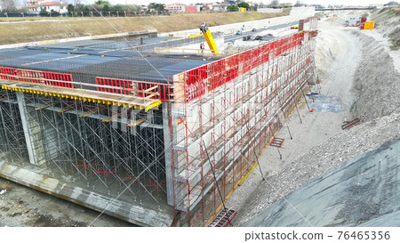 Highway construction site view. Civil engineering Highway construction site view. Civil engineering 76465356