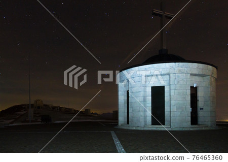 Monument with starry sky as a background 76465360