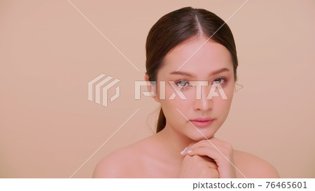 Beautiful face of Asian young woman with natural skin. Beautiful face of Asian young woman with natural skin. 76465601