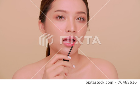 Beautiful face of Asian young woman with natural skin.  76465610