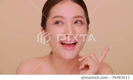 Beautiful face of Asian young woman with natural skin.  76465611