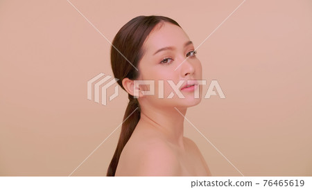 Beautiful face of Asian young woman with natural skin. Beautiful face of Asian young woman with natural skin. 76465619
