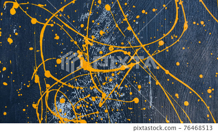 abstract oil color yellow color splatter paint on dark blue texture background. color paint texture background design 76468513