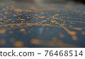 abstract oil color yellow color splatter paint on dark blue texture background. color paint texture background design 76468514