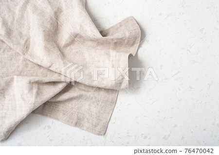 Linen tablecloth on marble kitchen table background Linen tablecloth on marble kitchen table background 76470042