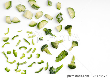 Handmade frozen semi-finished vegetable preparation. Chopped vegetables for quick cooking. The vegan diet Handmade frozen semi-finished vegetable preparation. Chopped vegetables for quick cooking. The vegan diet 76473573