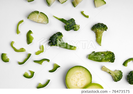 Handmade frozen semi-finished vegetable preparation. Chopped vegetables for quick cooking. The vegan diet Handmade frozen semi-finished vegetable preparation. Chopped vegetables for quick cooking. The vegan diet 76473575