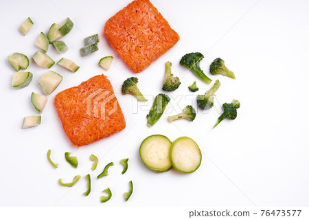 Handmade frozen semi-finished vegetable preparation. Chopped vegetables for quick cooking Handmade frozen semi-finished vegetable preparation. Chopped vegetables for quick cooking 76473577