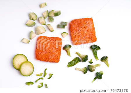 Handmade frozen semi-finished vegetable preparation. Chopped vegetables for quick cooking Handmade frozen semi-finished vegetable preparation. Chopped vegetables for quick cooking 76473578
