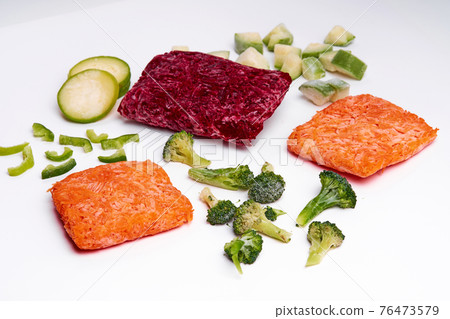 Handmade frozen semi-finished vegetable preparation. Chopped vegetables for quick cooking Handmade frozen semi-finished vegetable preparation. Chopped vegetables for quick cooking 76473579