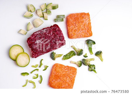 Handmade frozen semi-finished vegetable preparation. Chopped vegetables for quick cooking Handmade frozen semi-finished vegetable preparation. Chopped vegetables for quick cooking 76473580