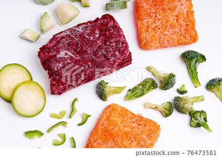 Handmade frozen semi-finished vegetable preparation. Chopped vegetables for quick cooking Handmade frozen semi-finished vegetable preparation. Chopped vegetables for quick cooking 76473581
