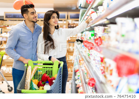 Family Grocery Shopping, Arabic Couple Buying Food In Supermarket Family Grocery Shopping, Arabic Couple Buying Food In Supermarket 76475410