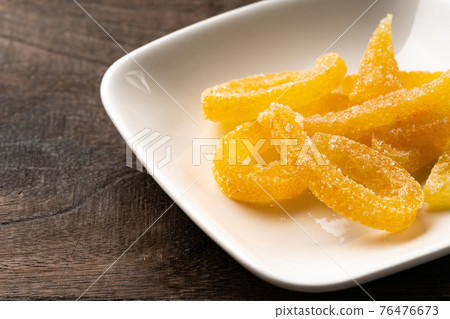 Candied summer oranges 76476673
