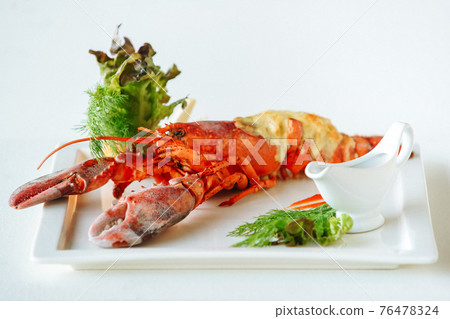 Lobster with grilled cheese, herbs and gravy boat Lobster with grilled cheese, herbs and gravy boat 76478324