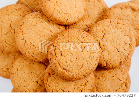 round oatmeal cookies. sweet treat to tea. round oatmeal cookies. sweet treat to tea. 76479227