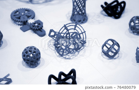 Many abstract models printed by 3d printer close-up. 76480079