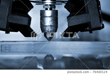 3D printer print isolated objects on mirror reflective surface close-up. 3D printer print isolated objects on mirror reflective surface close-up. 76480124