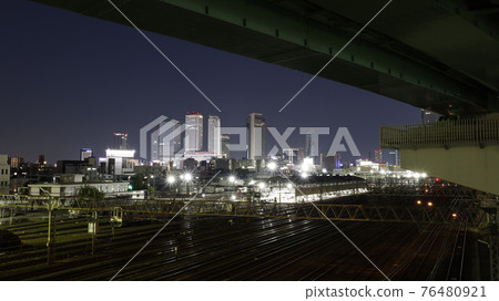 Night view of railroad tracks such as JR and skyscrapers around Nagoya Station as seen from the Golden Overpass in Nagoya City Night view of railroad tracks such as JR and skyscrapers around Nagoya Station as seen from the Golden Overpass in Nagoya City 76480921