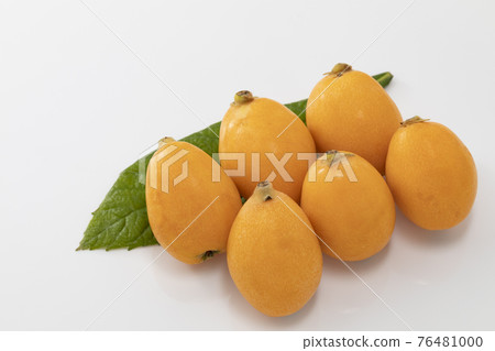 Loquat with leaves on a white background Loquat with leaves on a white background 76481000